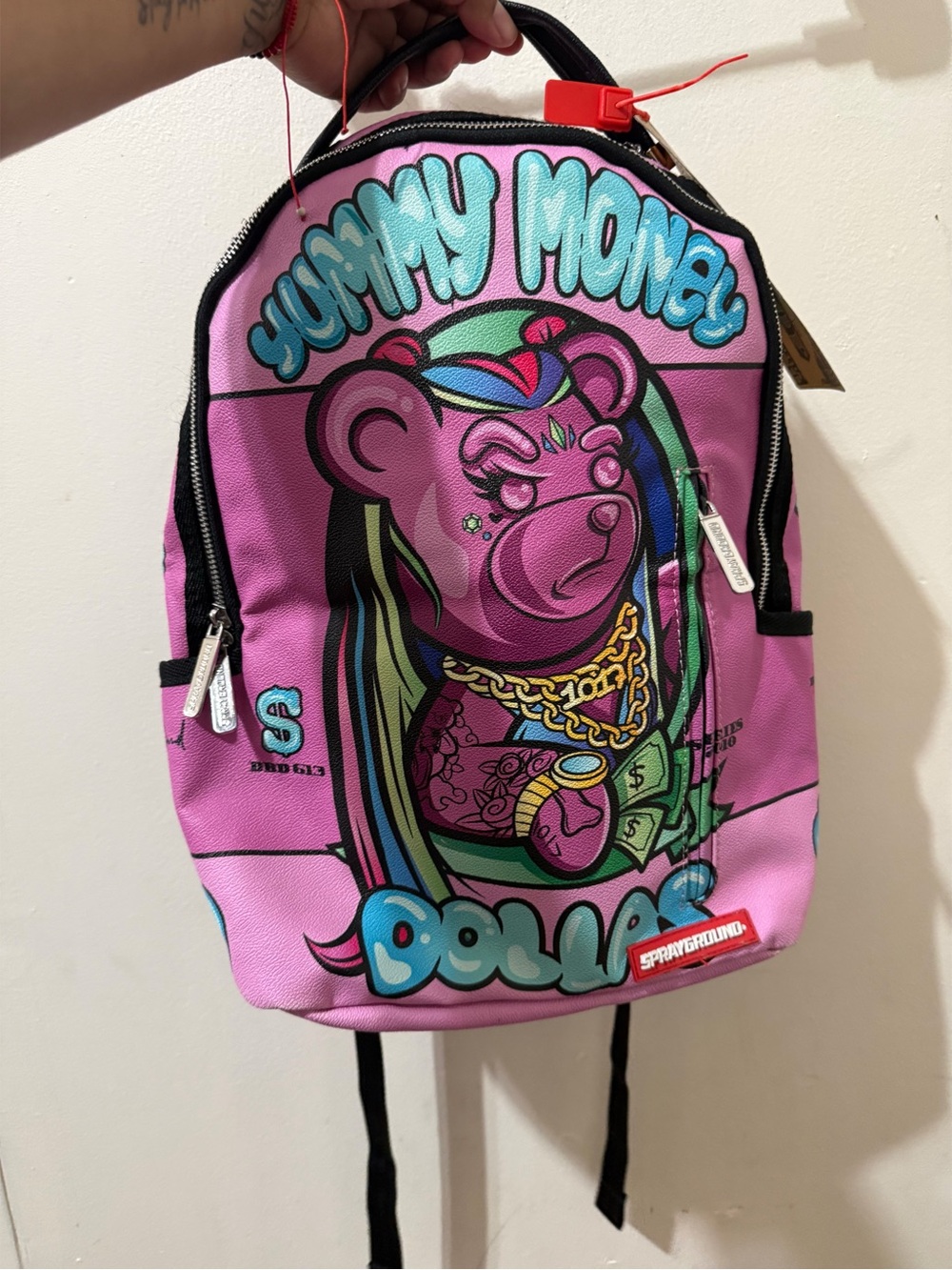 Sprayground Pink Cartoon Bear Graphic Backpack with Teal Accents